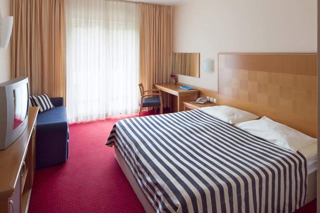 Ramada Hotel & Suites Kranjska Gora Habitación foto